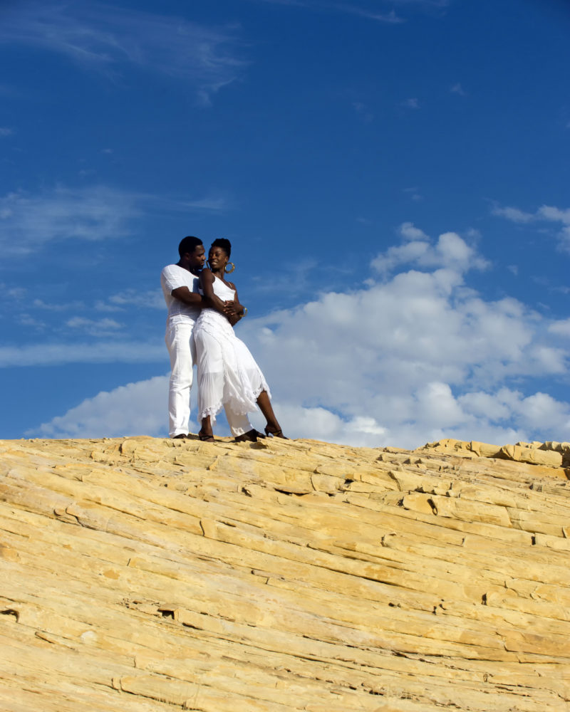 destination engagement nevada-weddings celebrety photographers travel with Anika of KC and the sunshine band singer and former prince drummer go to the desert for a romantic engagement shoot